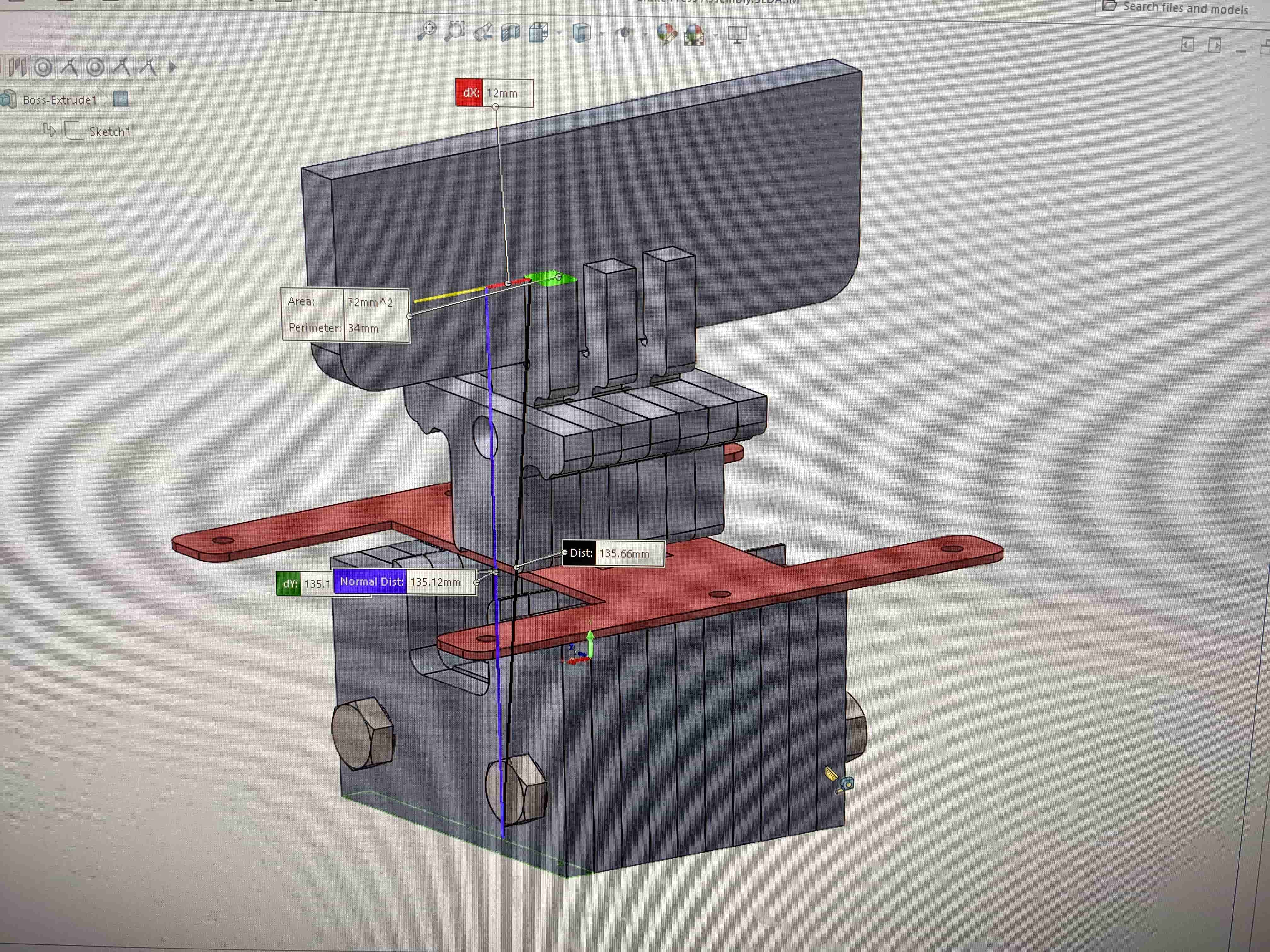SolidWorks detail of a custom clamping bracket fitted around structural beams