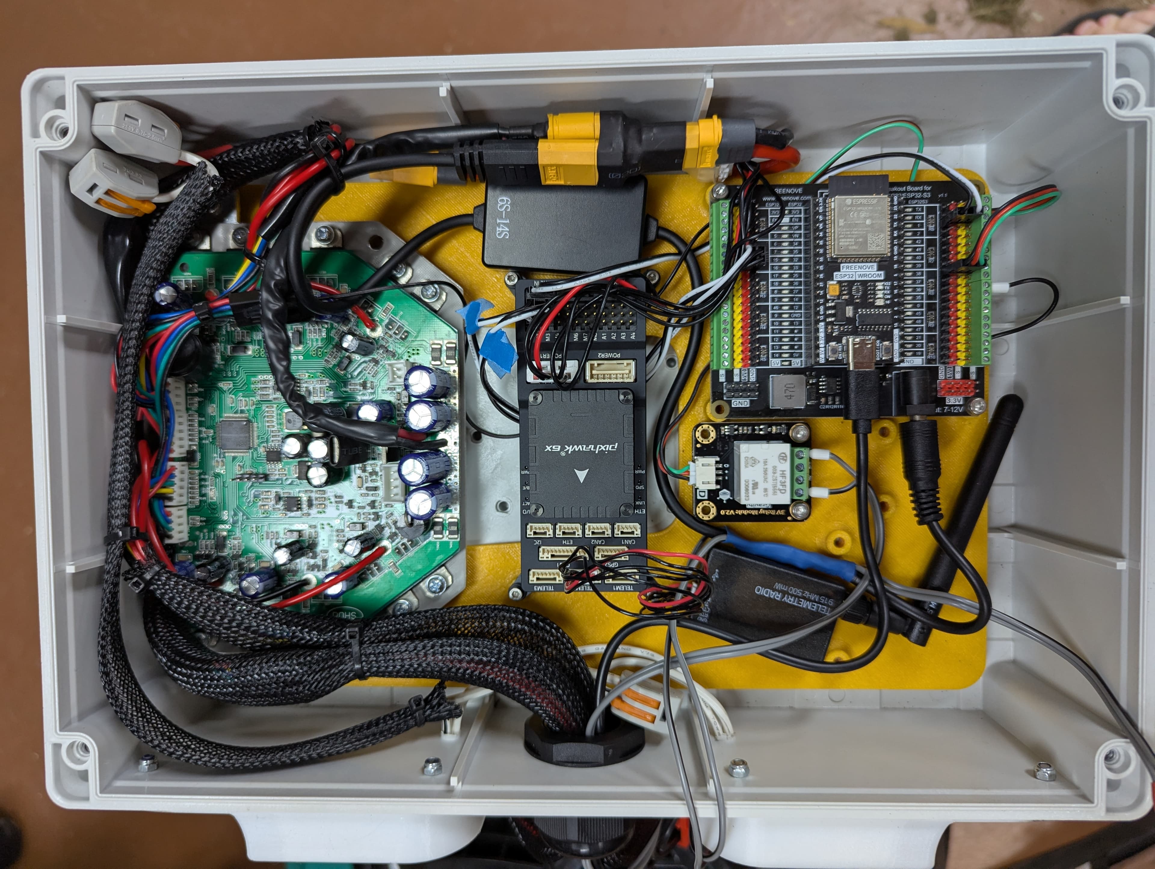 Autonomous mower prototype with its warning beacon illuminated during system operation