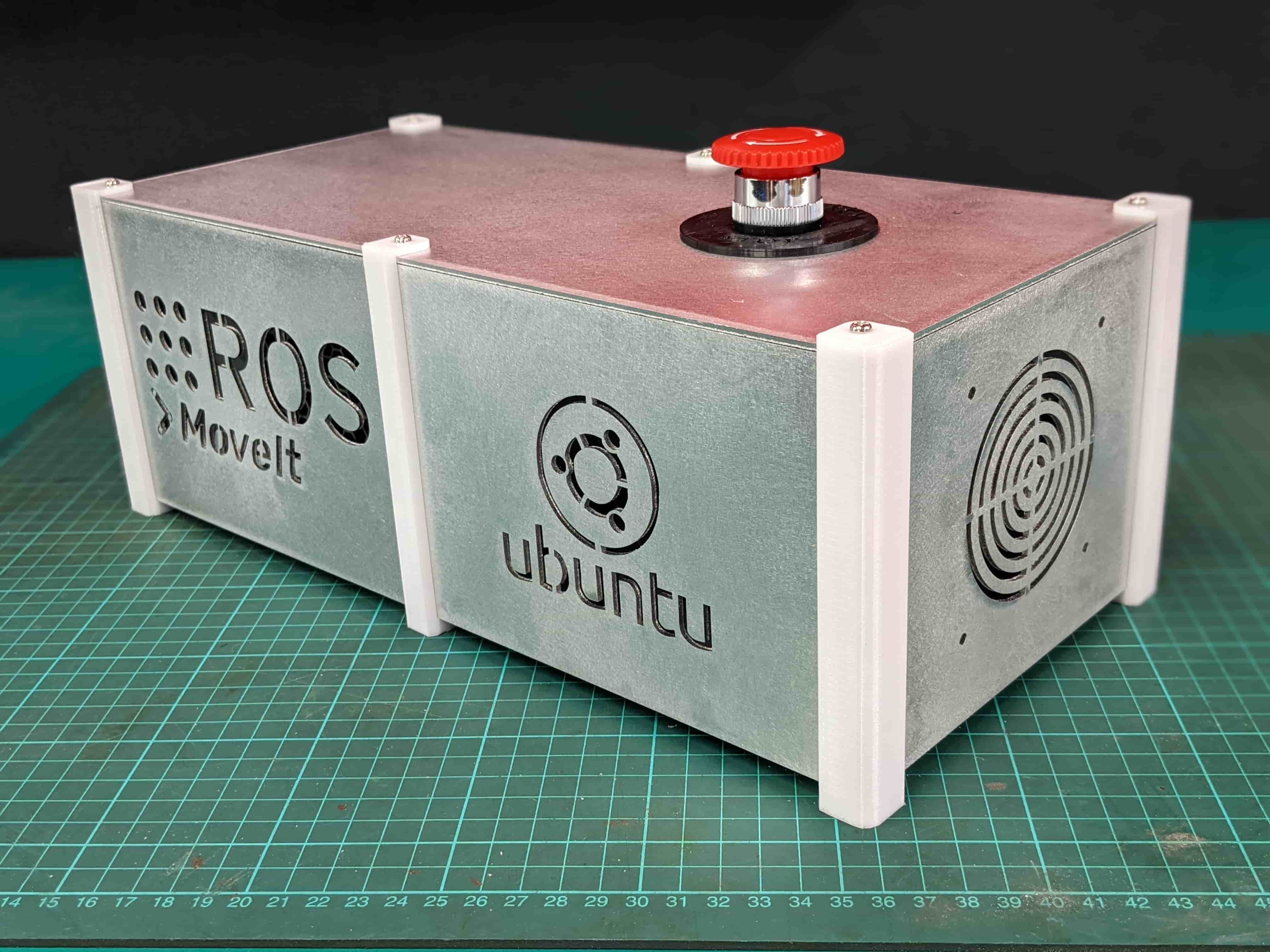 Closed control enclosure carrying Ubuntu and ROS branding, with its cooling fan and emergency stop