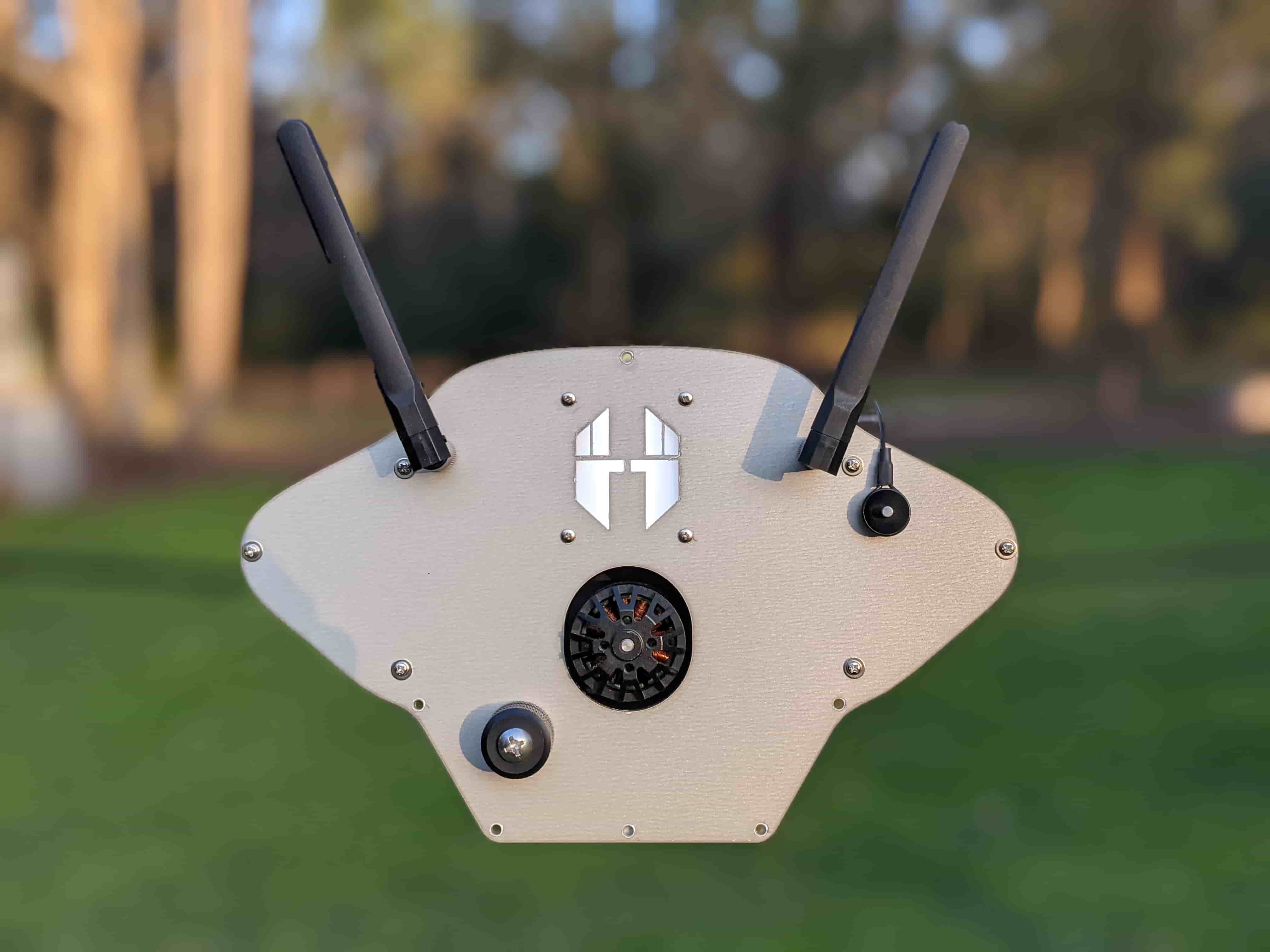 Front panel of the assembled camera car with its drive wheel, antennas and Fliight-branded housing