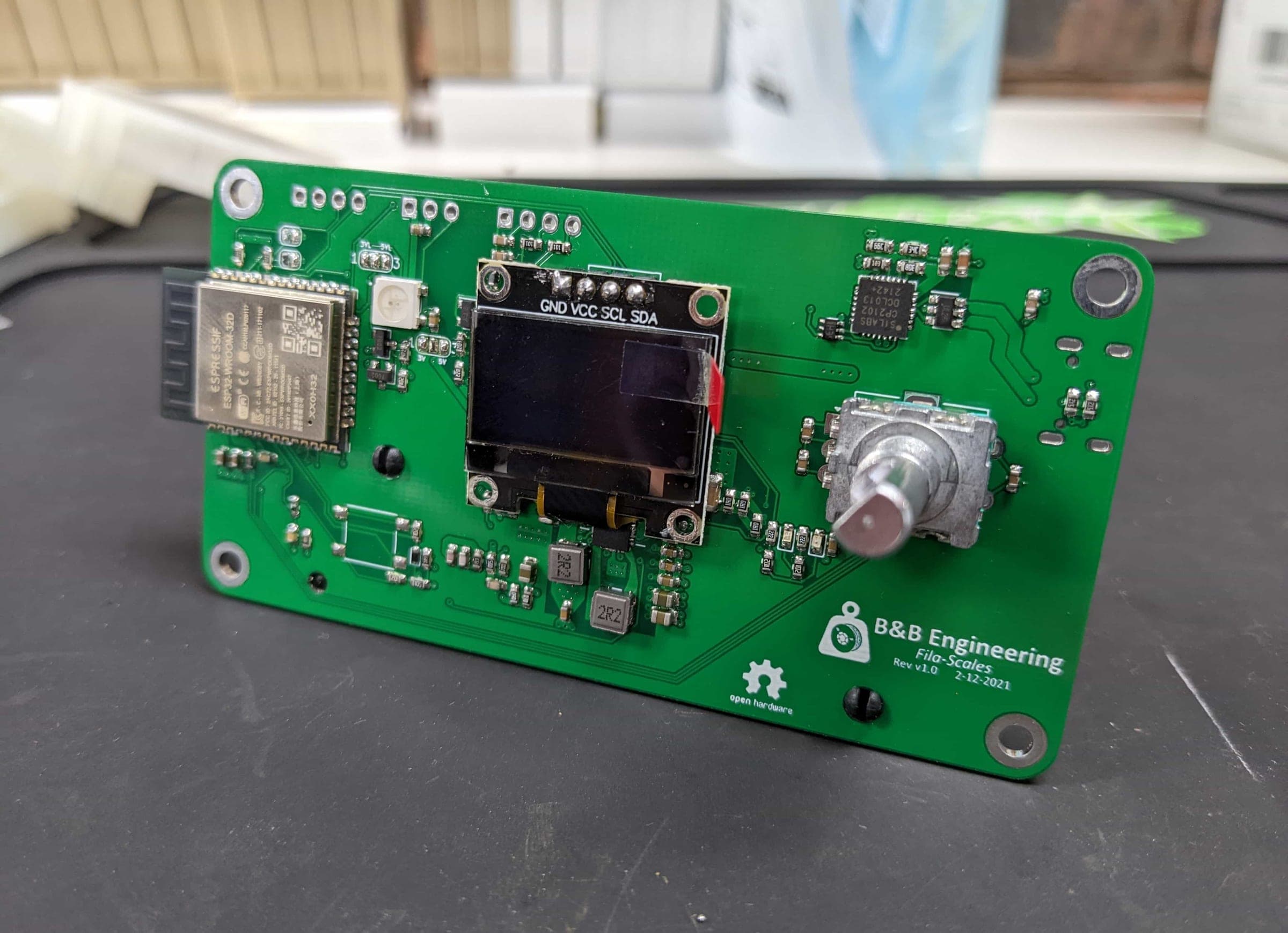 Populated Fila-Scales PCB with its ESP32 module, OLED display, rotary encoder and interface connectors