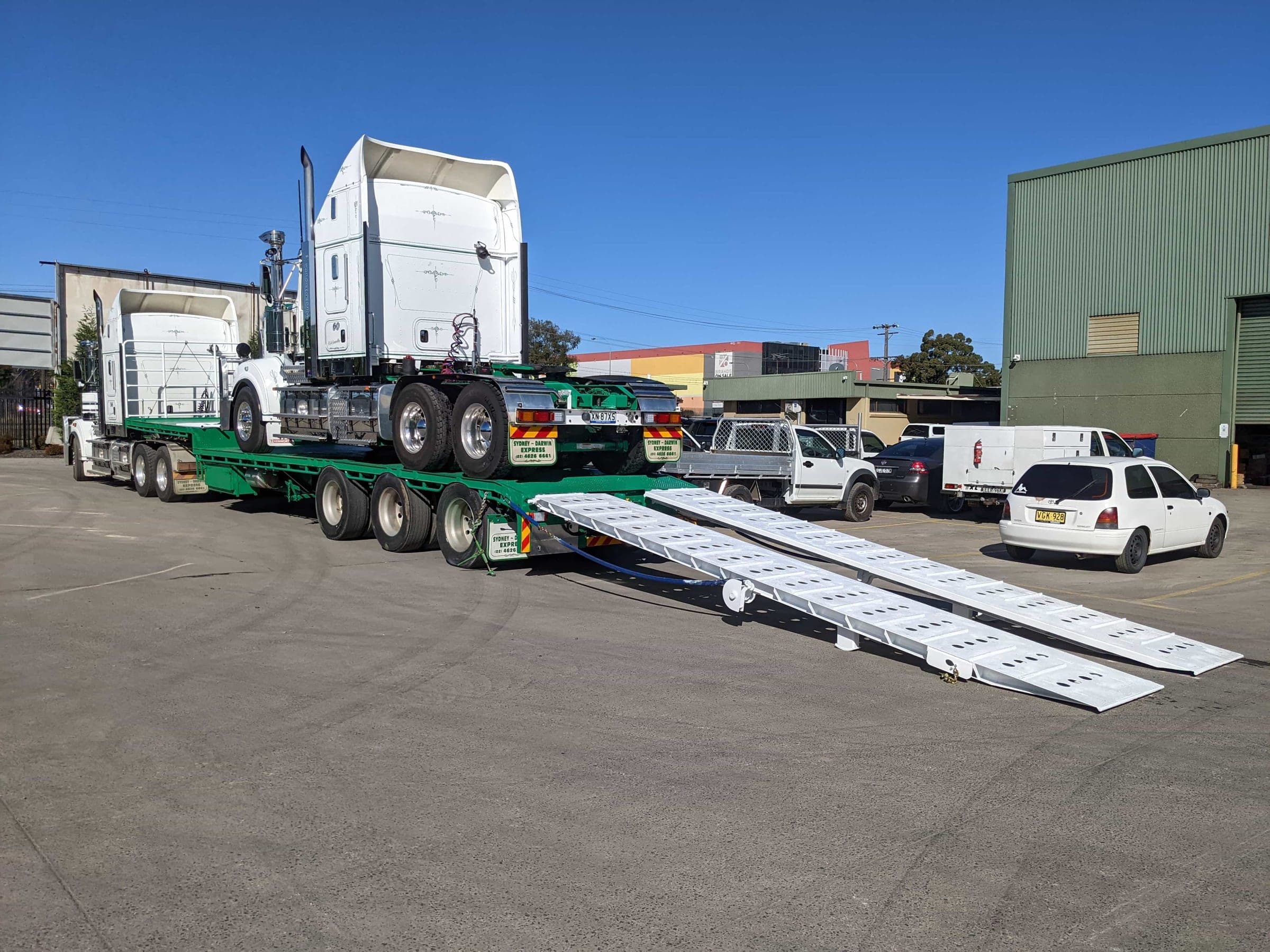 Close view of the loaded transport trailer and deployed ramp geometry